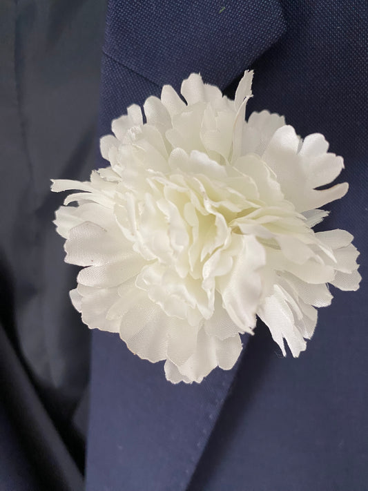 white carnation buttonhole lapel pin wedding formal occasion