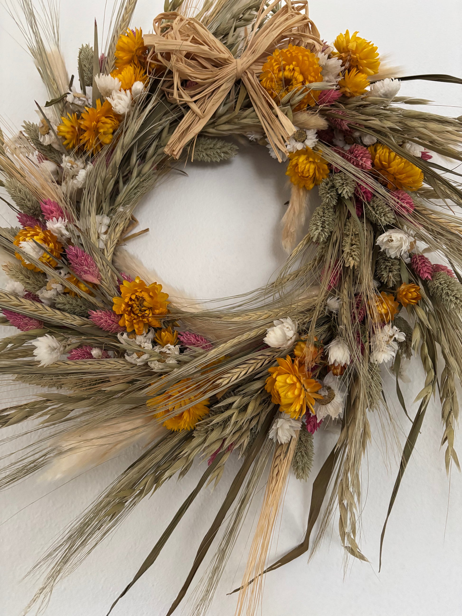 Yellow, white, ivory and pink dried flower wreath