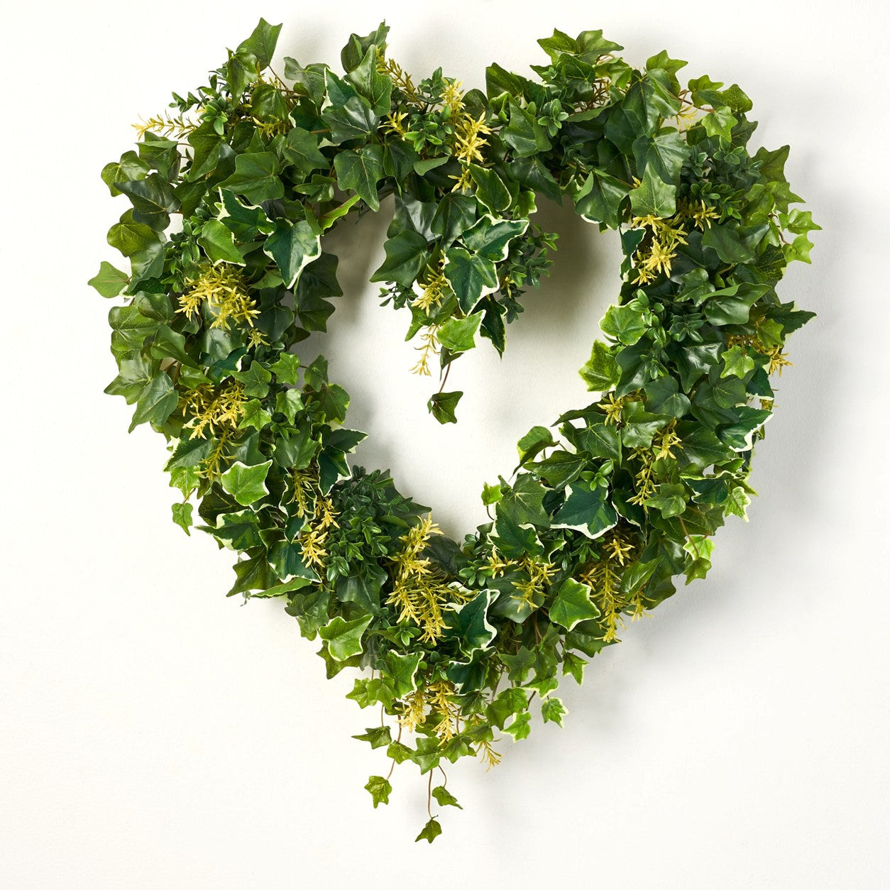 The Flower Pod - Learn how to make a gorgeous heart of fresh greenery for your door.