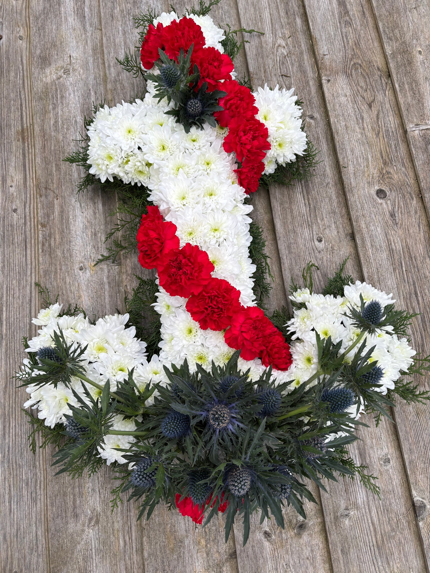 Anchor Funeral Tribute - Anchor in Red, White and Blue flowers.