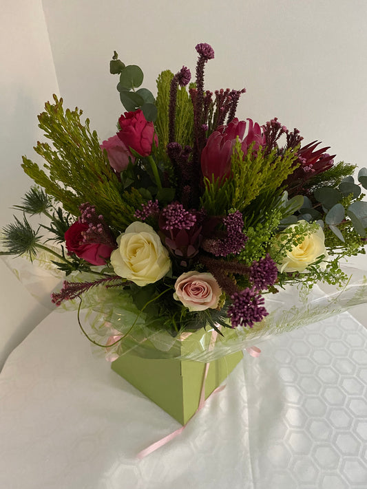 Wild Coast. Hand Tied Bouquet of mixed fresh flowers inspired by wildflowers.