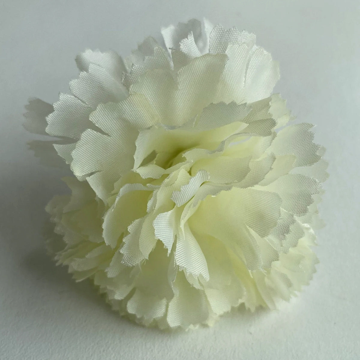 Cream carnation buttonhole lapel pin wedding formal occasion