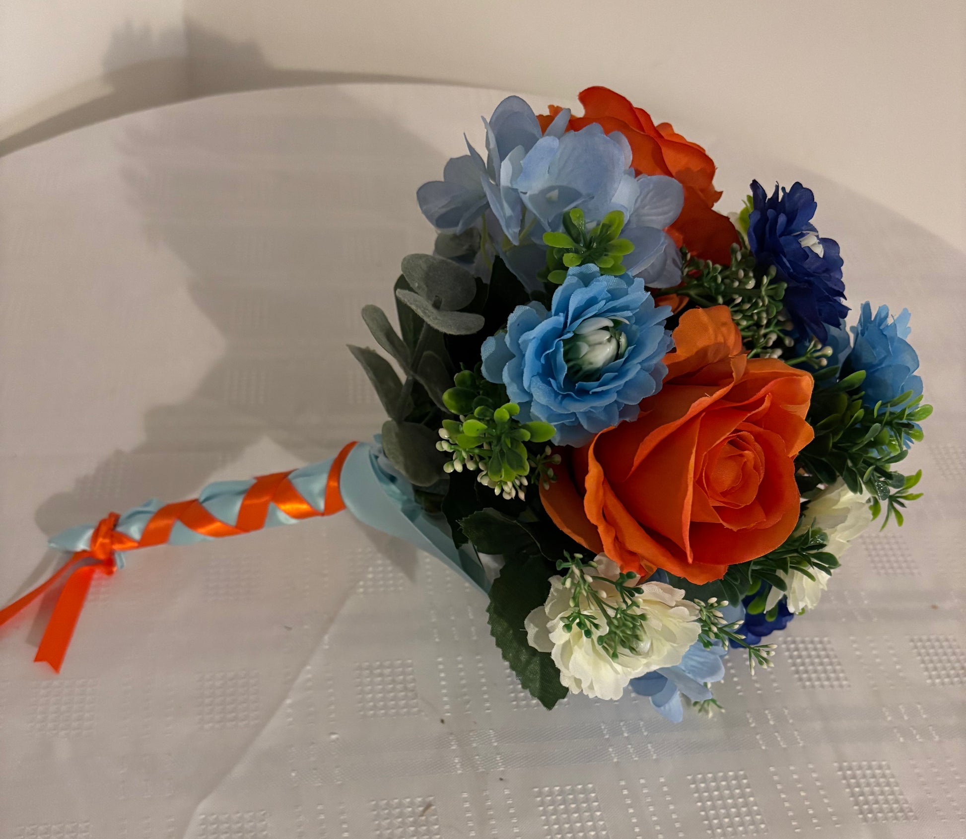 Brides posy bouquet with ribbon handle