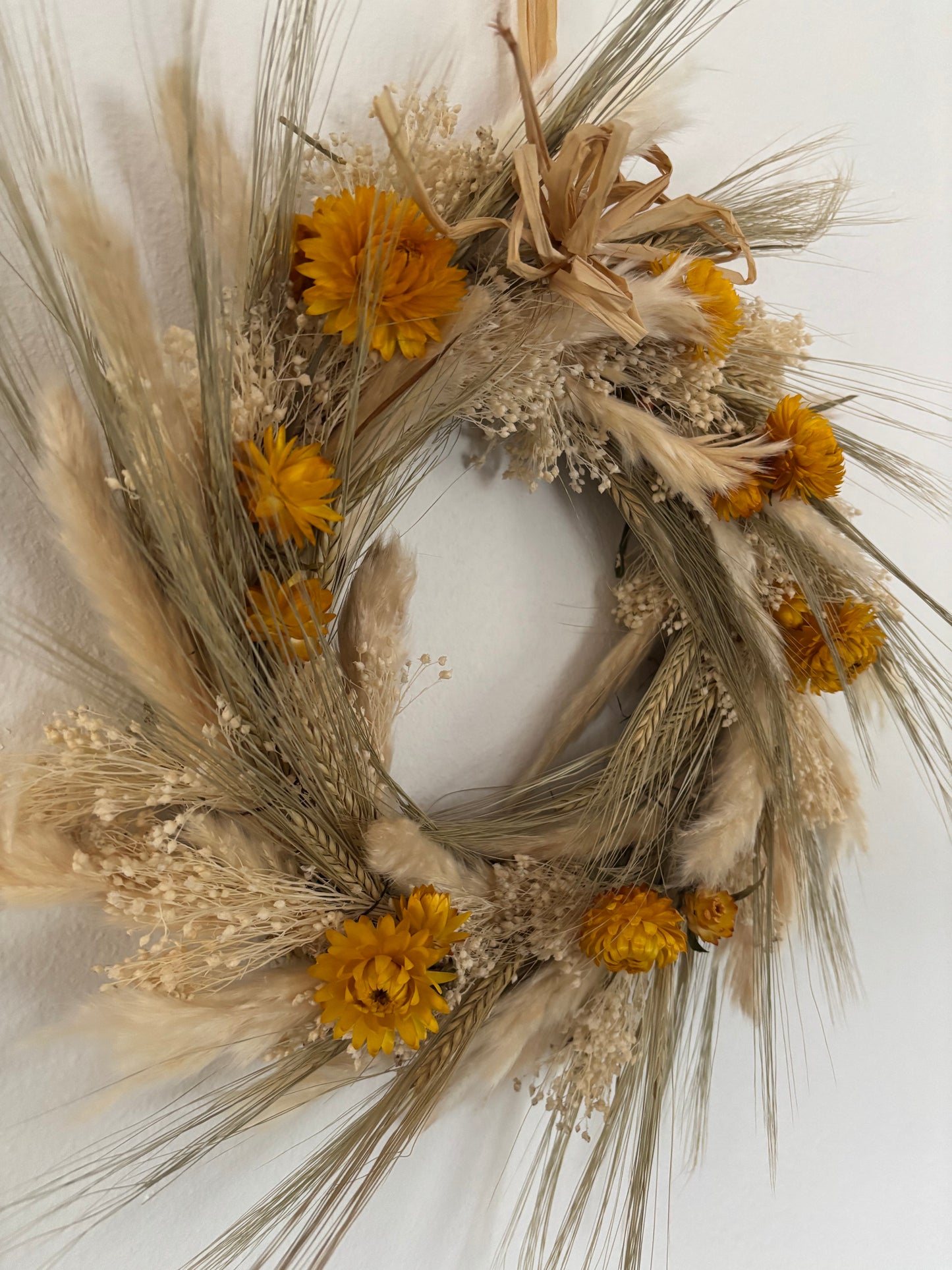 side view of dried flower and grasses wreath