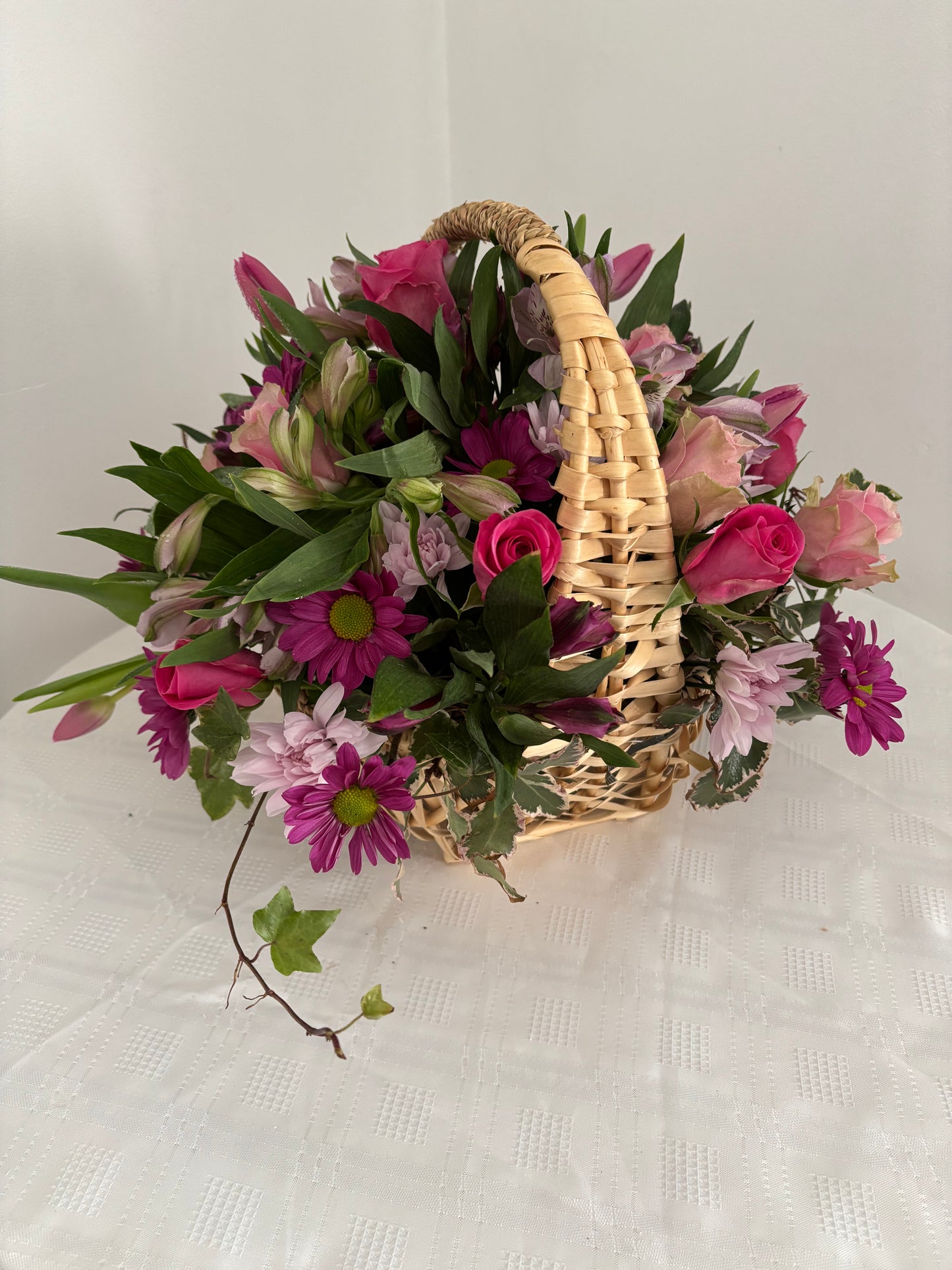 Fresh flowers basket arrangement