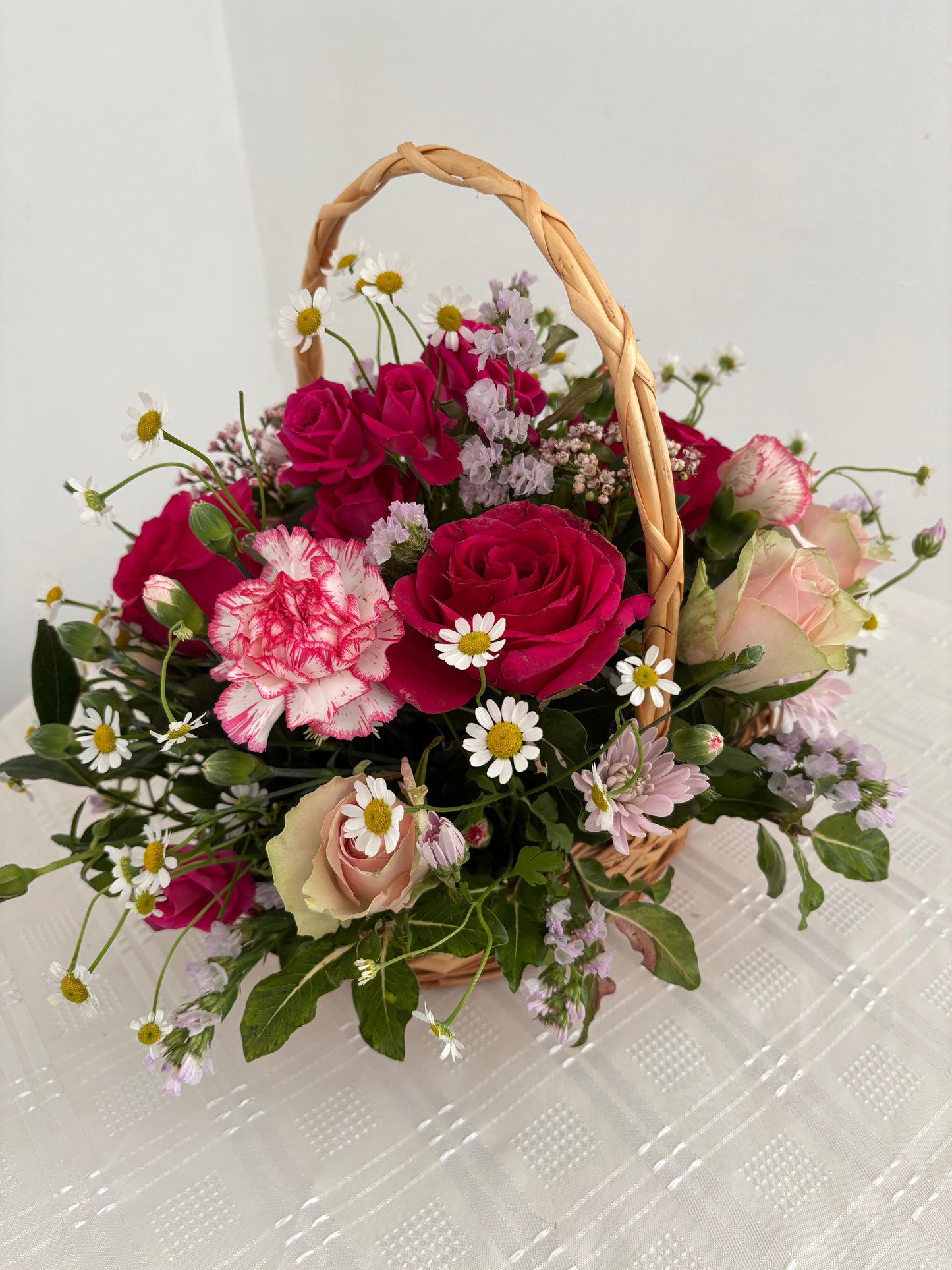 Basket of flowers in Shades of Pink.