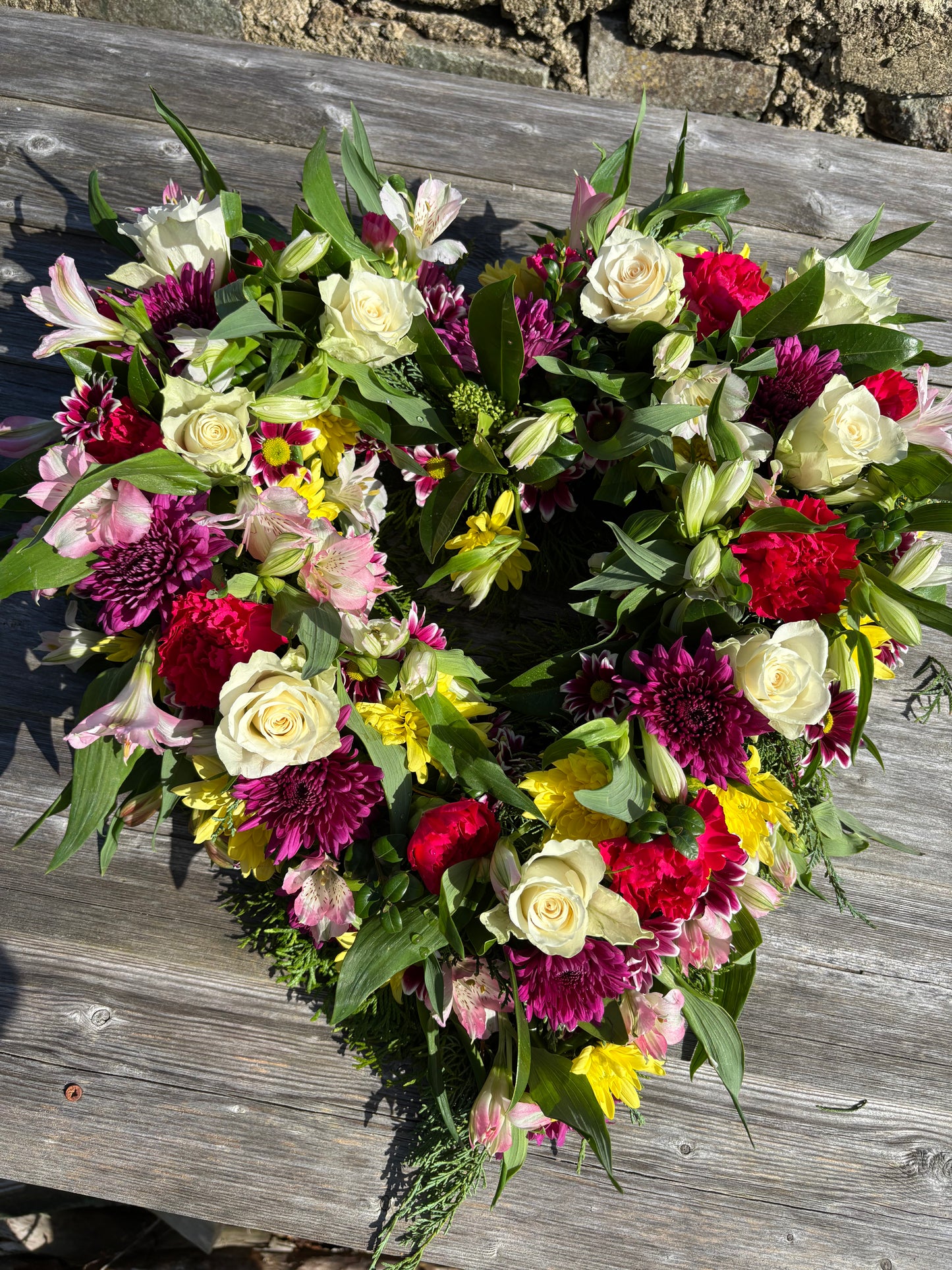 Open heart mixed flower Wreath Funeral Tribute  - mixed colour flowers.