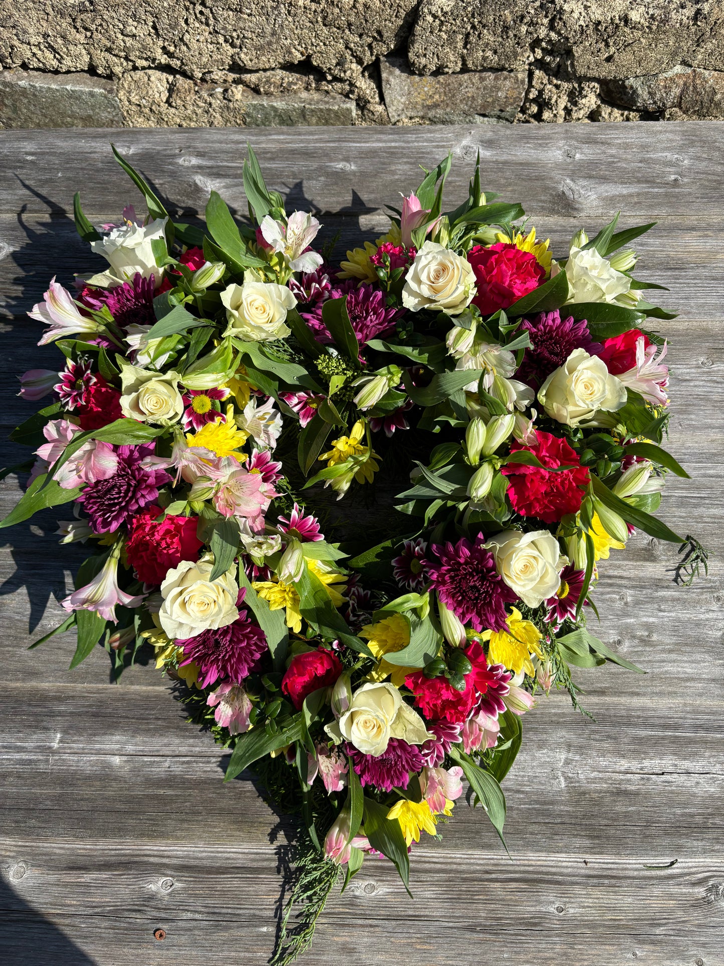 Open heart mixed flower Wreath Funeral Tribute  - mixed colour flowers.