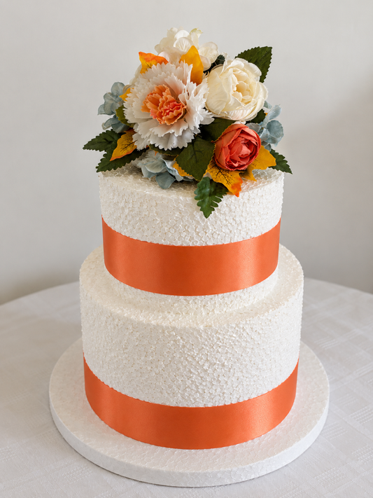 Cake topper. Silk flowers Cake decoration. Warm orange carnations and peonies.