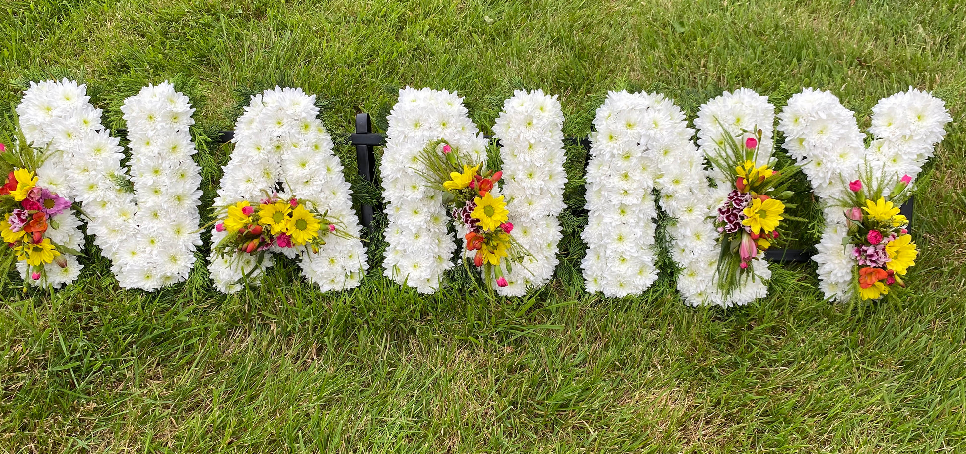 NANNY floral funeral tribute flowers