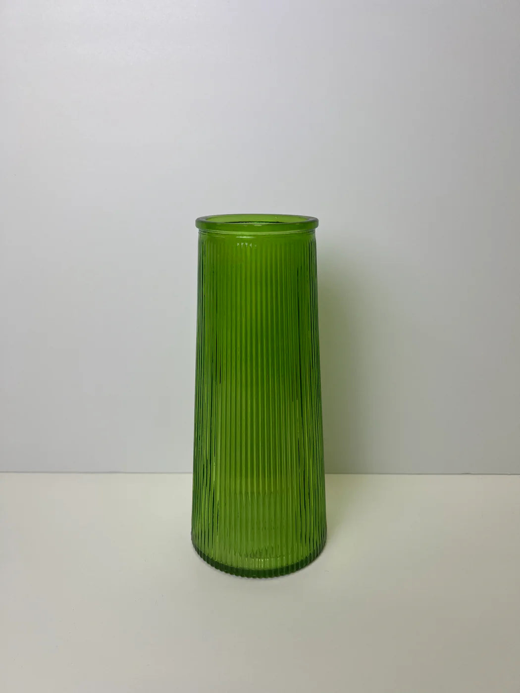 Glass Vase. Emerald green tall ribbed glass vase